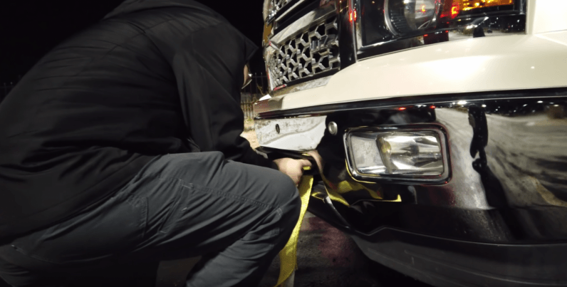 Video shows Tesla owners could just tow pickups blocking Supercharger stations… if they wanted