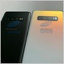 Pictures of what appear to be the two models of Samsung's Galaxy S10 leak, showing "Infinity-O" display, very thin bezels, USB-C port, and a headphone jack (James Vincent/The Verge)
