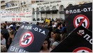 In wake of Christchurch shooting, YouTube still hosts neo-Nazi propaganda and podcasts; after an inquiry, it demonetized several videos but did not delete them (Ben Makuch/Motherboard)