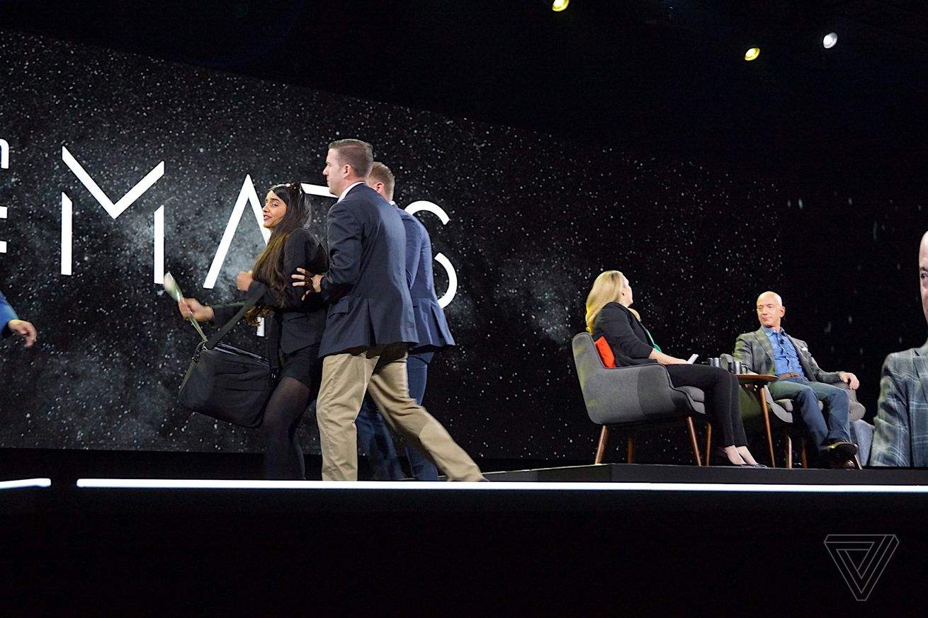 Jeff Bezos interrupted by a protestor asking him to do something about chicken farms