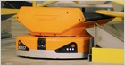 Inside an Amazon sorting facility, where humans work alongside mobile robots, known as drives, fueling Amazon's push toward widespread same-day delivery (Matt Simon/Wired)