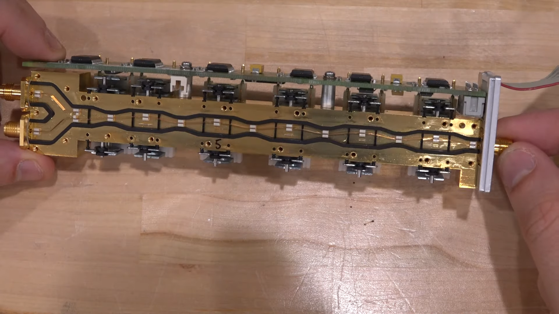 A Look Inside a 70-GHz Electromechanical Attenuator